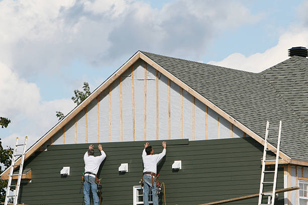 Professional Siding Contractor technician working in Arlington, OH